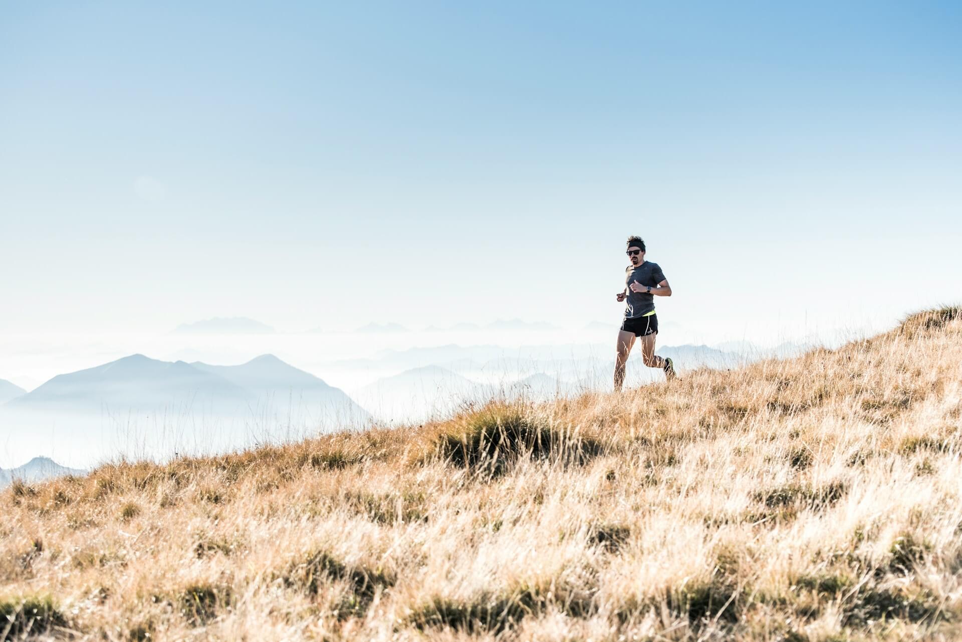 a man running wild in the mountains